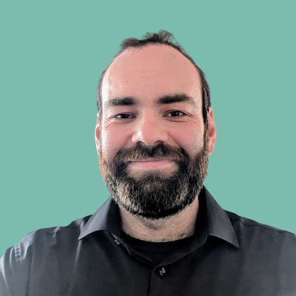 Picture of Sébstien Poulin against a teal background